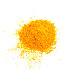 Turmeric (Curcuma) powder pile isolated on white background, top view