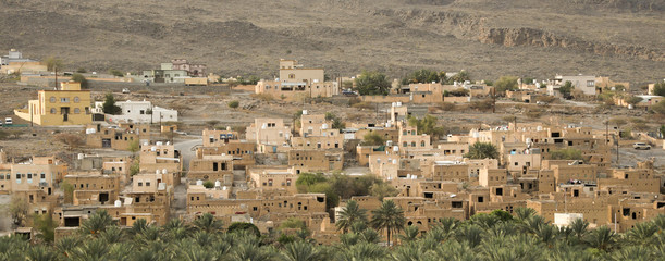 View of a mountain village composed of ancient clay houses in the Sultanate of Oman