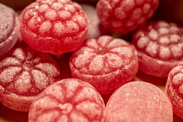 Close-up of red bonbon candies. Red Candies background.
