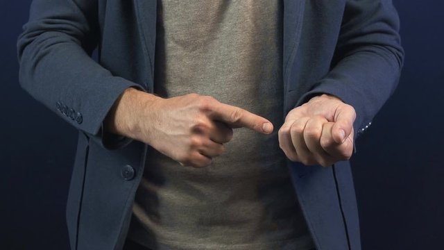 Performer showing trick with soft balls