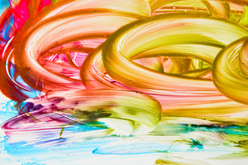 Beautiful abstract brushstrokes with colorful gouache paint on white paper for backgrounds 
