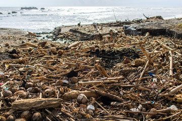 Environmental pollution. Heap of rubbish and waste on the beach in Bali, Indonesia