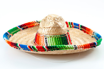 Cinco de mayo, traditional mexican hat and caribbean culture concept theme with close up on wicker...
