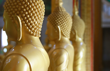 Back side of a gold Buddha image background