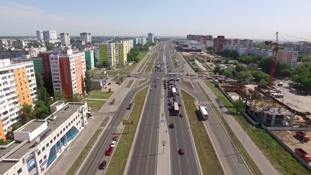 road intersection in modern city in summer day, aerial view