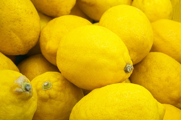 Colorful Display Of Lemons In Market .lemon on the market counter top view