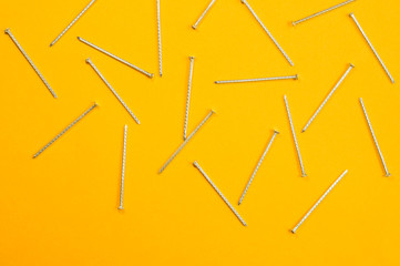 Nails on a yellow background