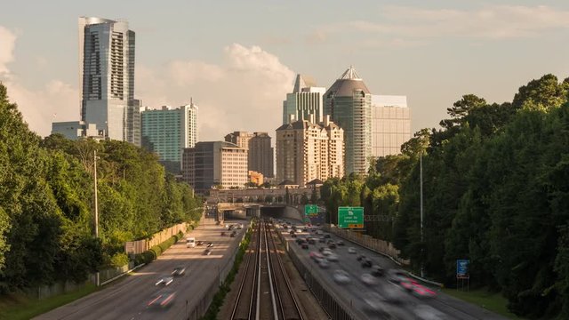 Atlanta skyline view of the Buckhead district from the GA 400 highway as rush hour is at it's peak in the evening hours.