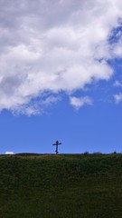 Fototapeta na wymiar orthodox wooden cross on the hill