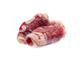 Fresh raw beef meat slices isolated over white background