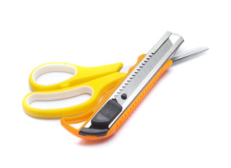 yellow scissors and cutter isolated on White Background