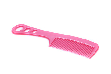 Pink comb isolated on white background