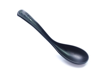 plastic black spoon, isolated on white background