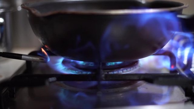 Slow Motion Ignition Gas Stove with Pot Ready for Cooking