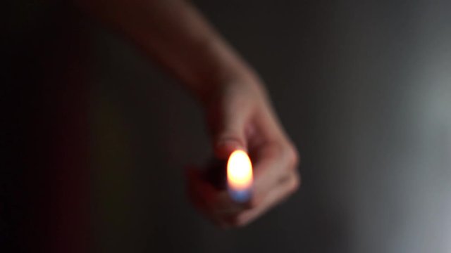 Handling a Gas Fire Starter (Front View_Close Up)
