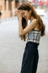 Asian fashion girl on the street in Shanghai