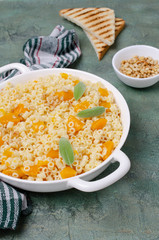Traditional pasta with pumpkin slices