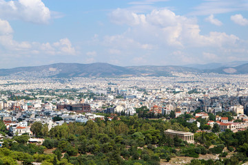 Fototapeta na wymiar Scenic panoramic aerial view of the white city Athens Greece from acropolis under summer blue sky with clouds