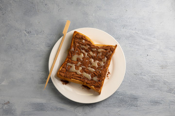 Grilled bread with milo and condensed milk flat lay view