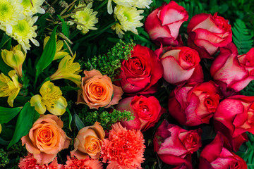 Beautiful bouquet of mixed flowers of chrysanthemums, cloves and roses