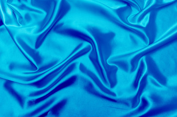 Obraz premium Blue satin fabric texture background