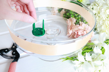 How to make floral decorations on summer party table. Centerpiece with rose, dahlia and hortensia flowers