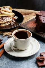 Cup of coffee on grey stone background.