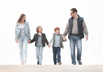 Fototapeta premium happy family walking, holding each other's hands.