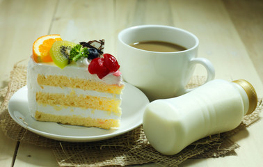 cake and coffee on wood table