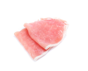 Raw pork meat with parsley herb leaves isolated on white background
