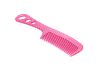 Pink comb isolated on white background