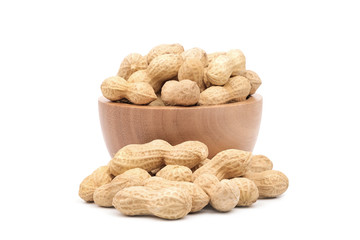 Peanuts in wooden bowl on white background.