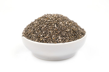 Chia seeds in a white bowl isolated on white background.