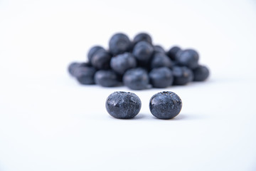 Delicious bunch of blueberries - Ripe blueberries - Two wet and ripe blueberries