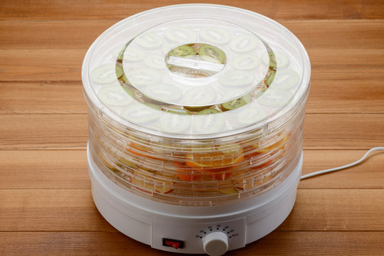 Electric dehydrator packed with fruits