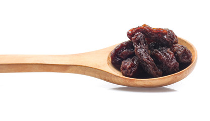 Organic dried Raisins isolated on white background