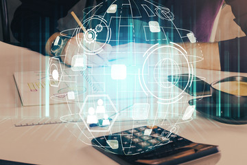 Man's hands working with notes background. Social networking scheme . Mixed media