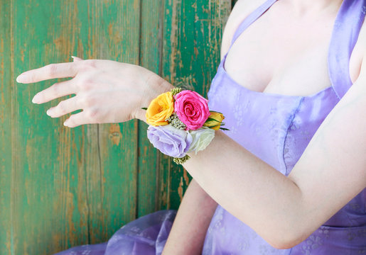 Wrist corsage with eustoma and roses. Flower bracelet, handmade decoration.