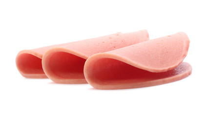 Boiled sausage slices isolated on white