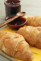 Croissants with marmalade and tea