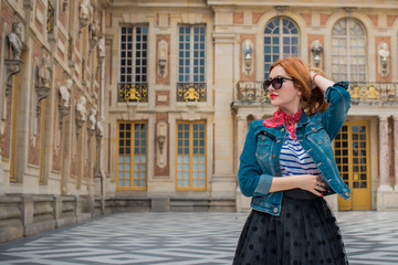 Holidays in Versailles, France. Fashionable pretty woman in trip, concept of vacation. Lady in...