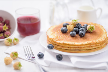 Pancakes with blueberry and raspberry