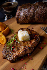 Butter Beef Steak with herbs and potato wedges
