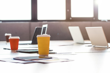 Big table with modern devices prepared for business meeting