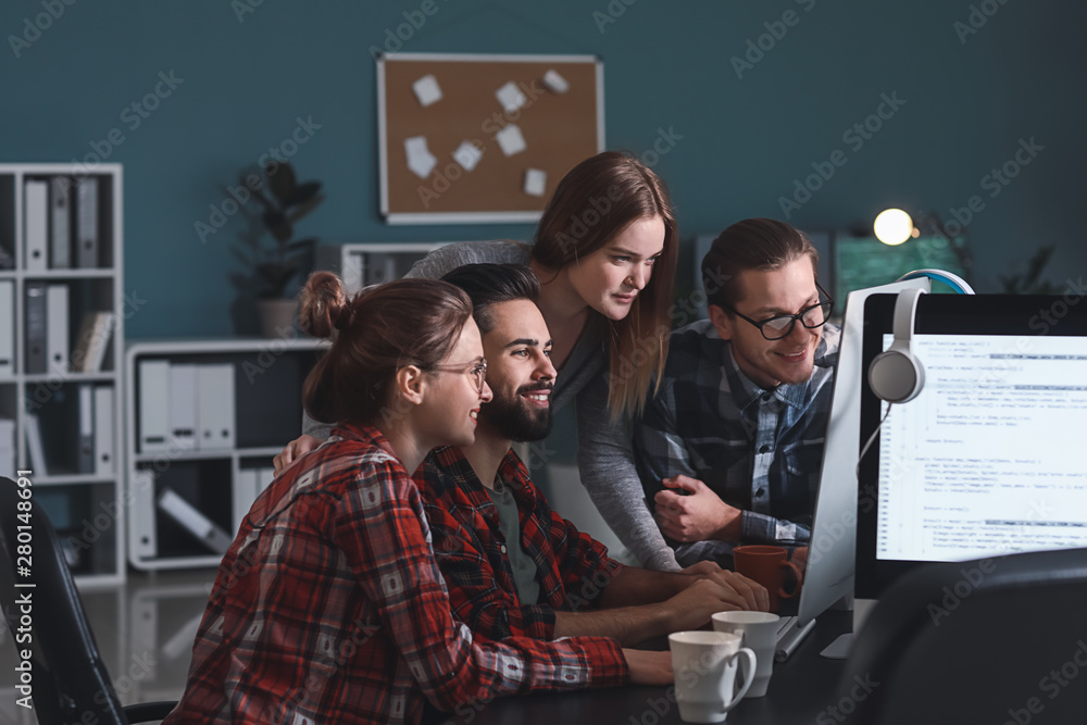 Aufkleber team of programmers working in office