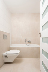 Fototapeta na wymiar Interior of small bathroom in contemporary house