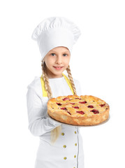 Cute little chef with pie on white background