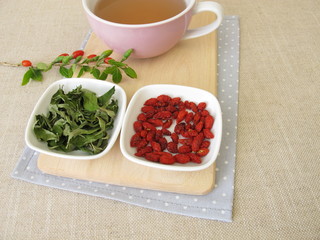 Tea with dried goji berries and goji leaves