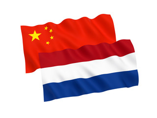 Flags of Netherlands and China on a white background