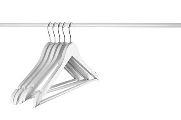 Rack with clothes hangers on white background